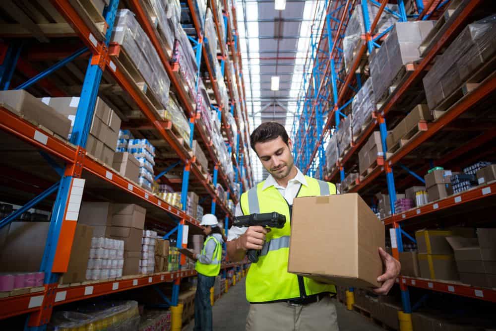 warehouse-worker-scanning-box warehouse worker scanning box with rf wireless device