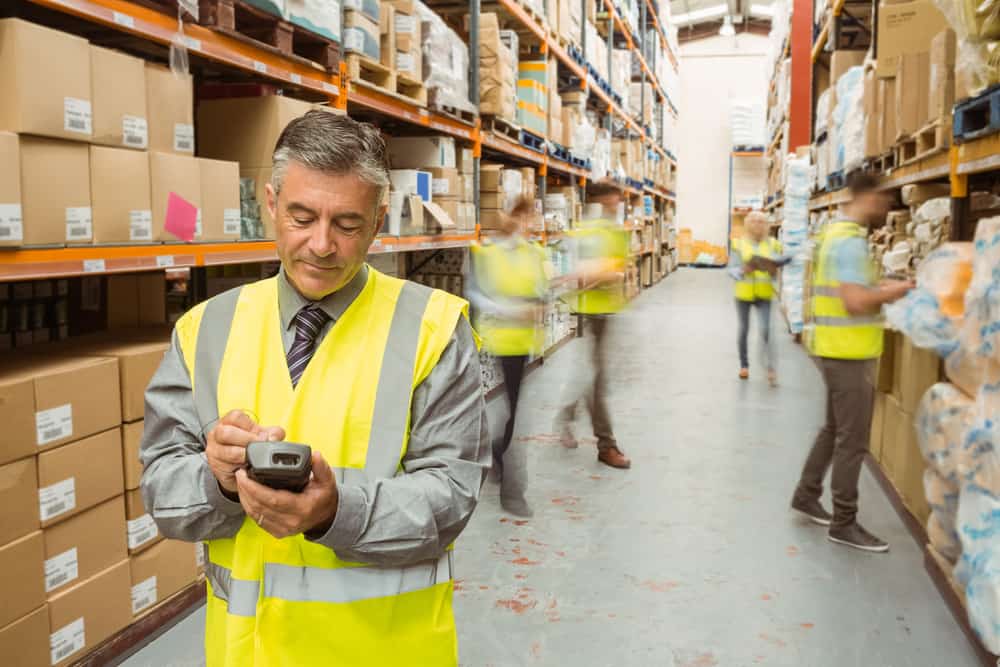 warehouse workers in large warehouse